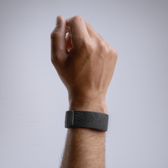 A right arm equipped with an EMG wristband