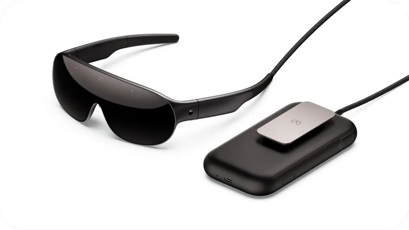Meta VR Glasses beside a compact compute puck