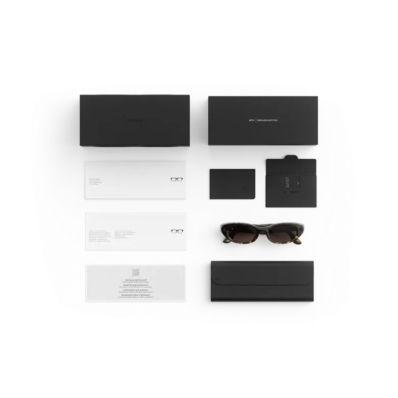 Items included with purchase of Meta AI glasses - Meta charging case, Meta AI glasses, and getting started guide.