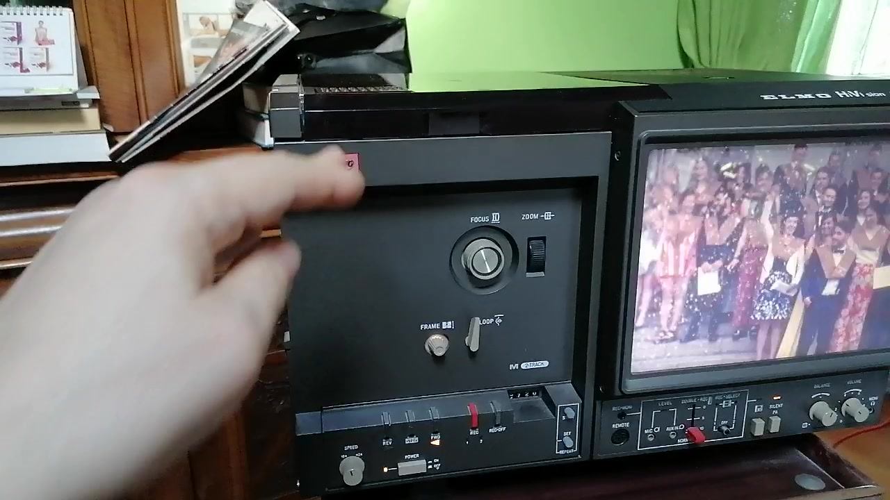 ELMO SC30. I own two of this fine twin track machines, with 1.1