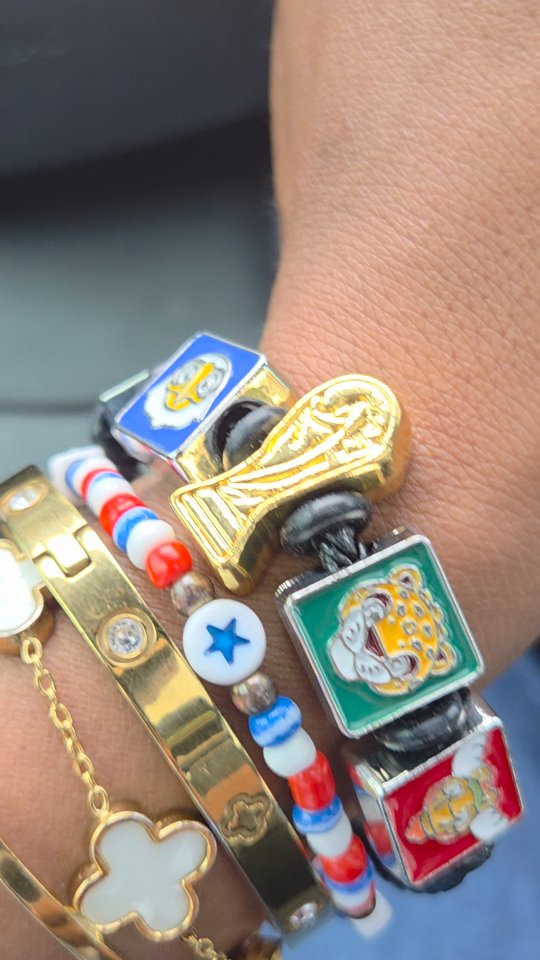 Free merchandise from FIFA Fan Fest, like charm bracelets and