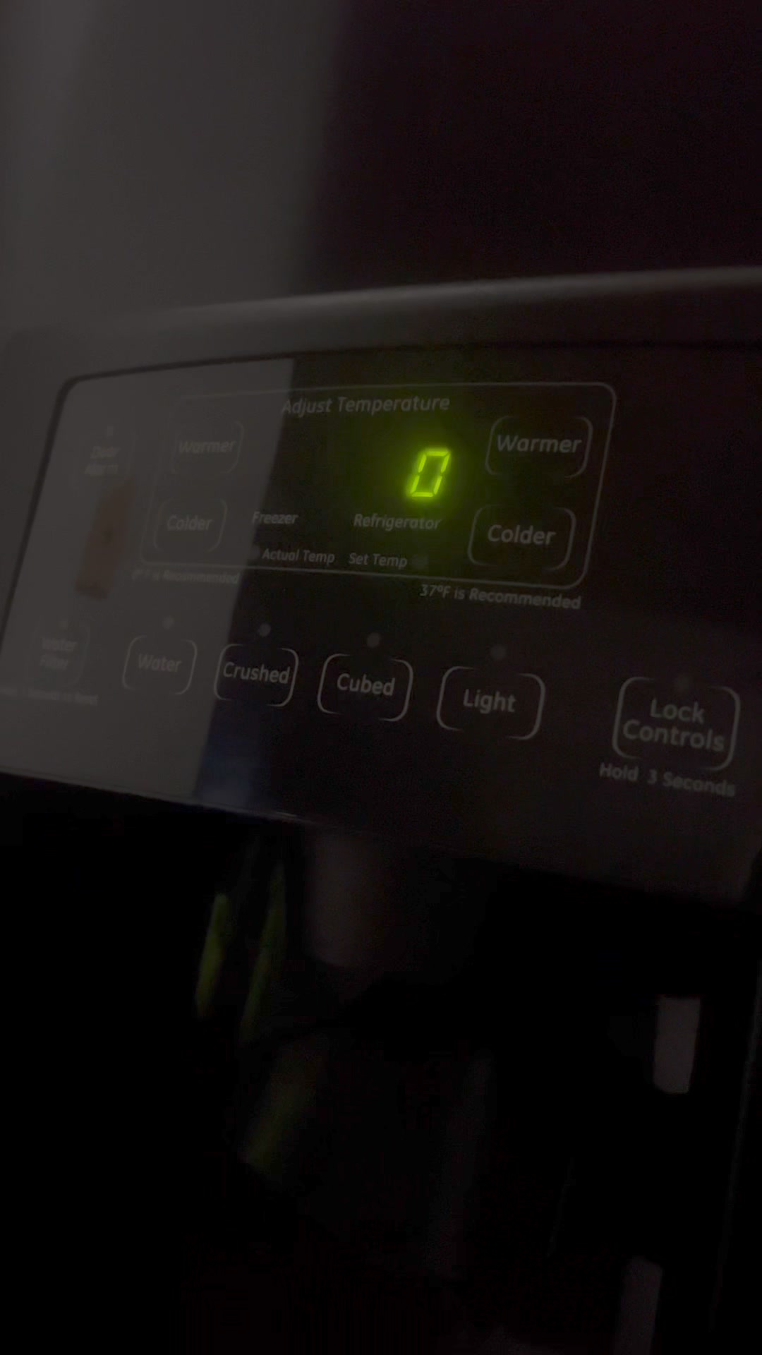 Why is my GE side by side fridge making a loud buzzing noise?