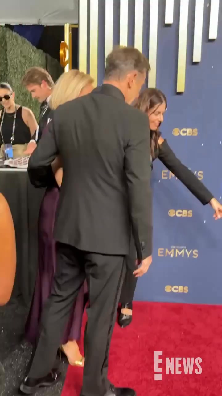 jason-isaacs-and-emma-hewitt-arrive-in-style-to-the-emmys-e-news