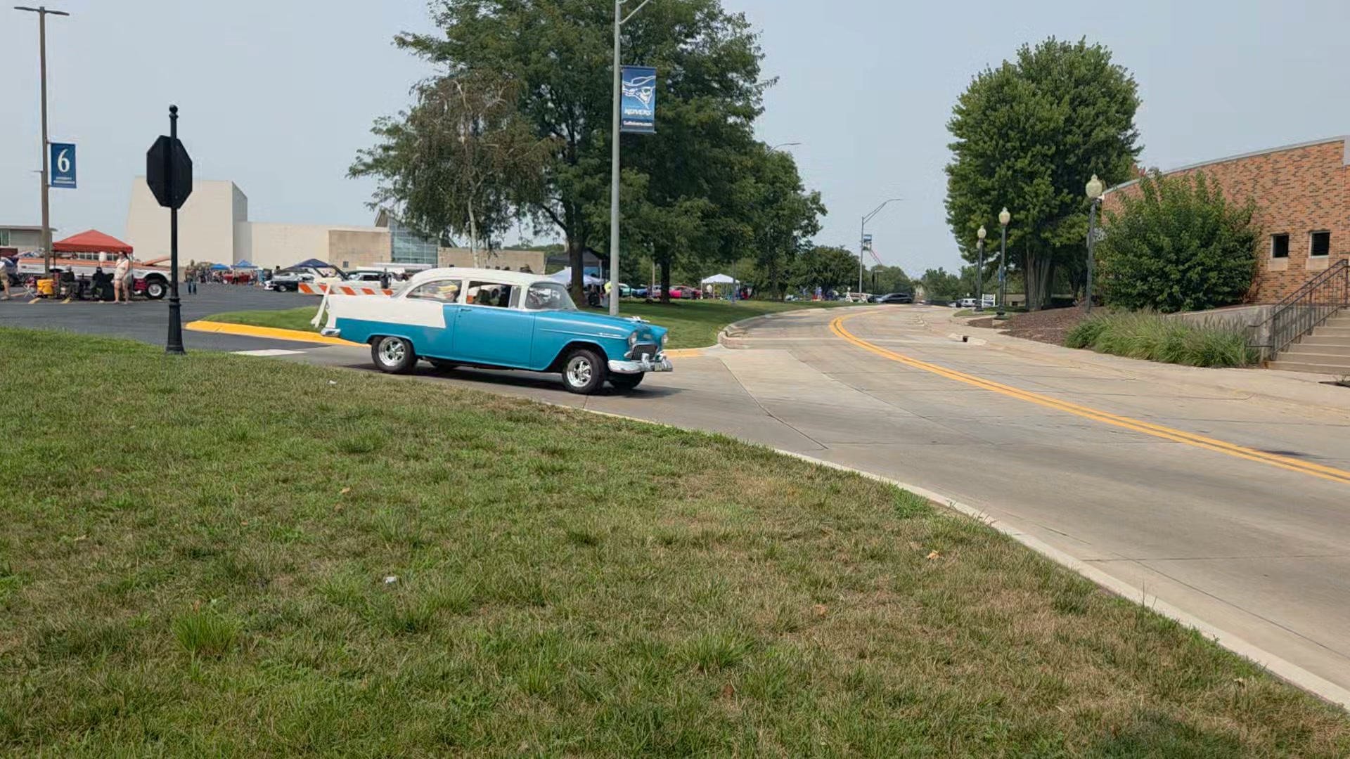 Cars leaving the 2026 Wags & Wheels Car Show in Council Bluffs, Iowa.