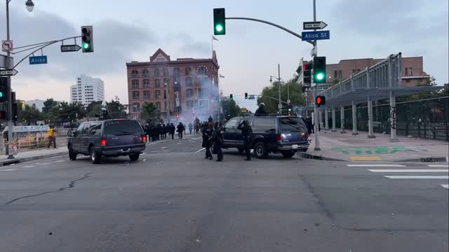 Happening now. LAPD takes intersection of main and aliso where the mob ...