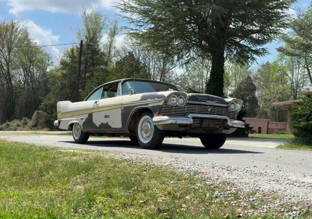 1958 Plymouth Fury. 318 cubic inch V8. Dual quad carburetion