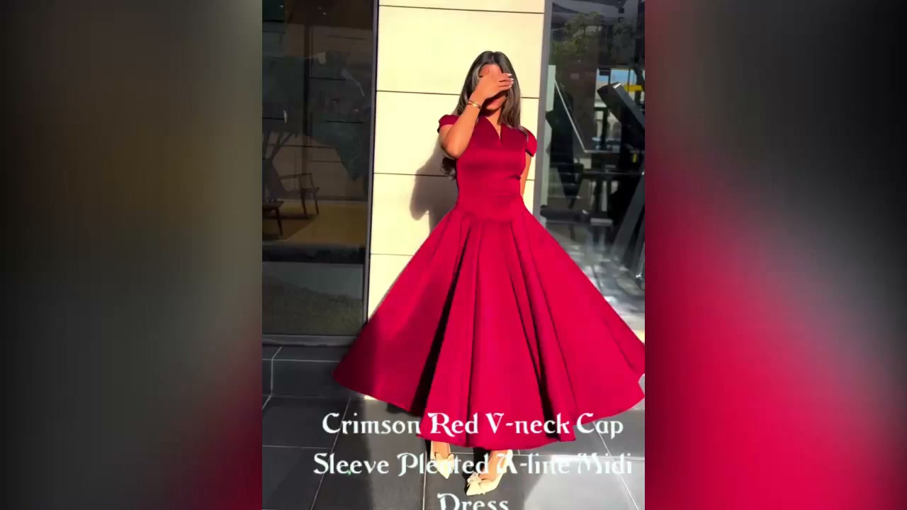 A timeless silhouette in a bold, unapologetic red. The Crimson Red V-neck Cap Sleeve Pleated A-line Midi Dress is a wardrobe classic that never goes out of style. A fitted bodice with a clean 