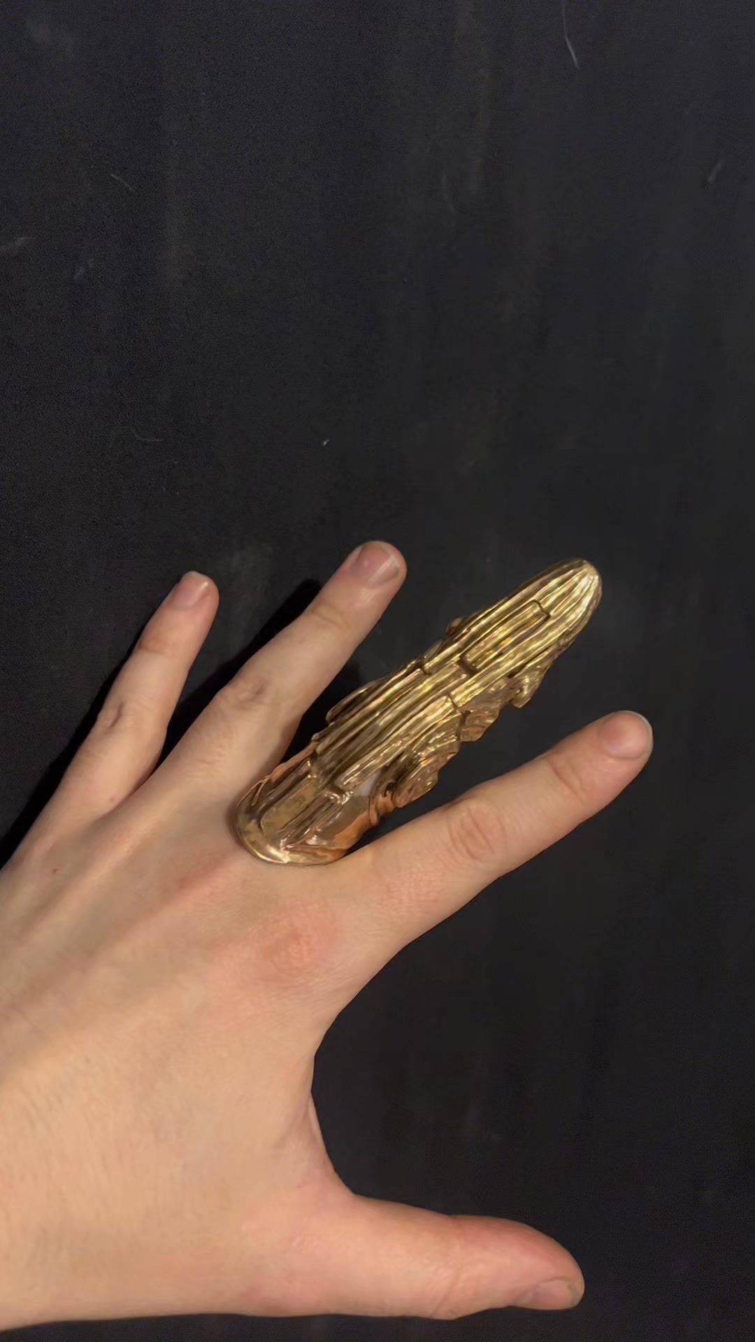 This ring is cast in bronze, using a hand carved piece of wax as a mold ...