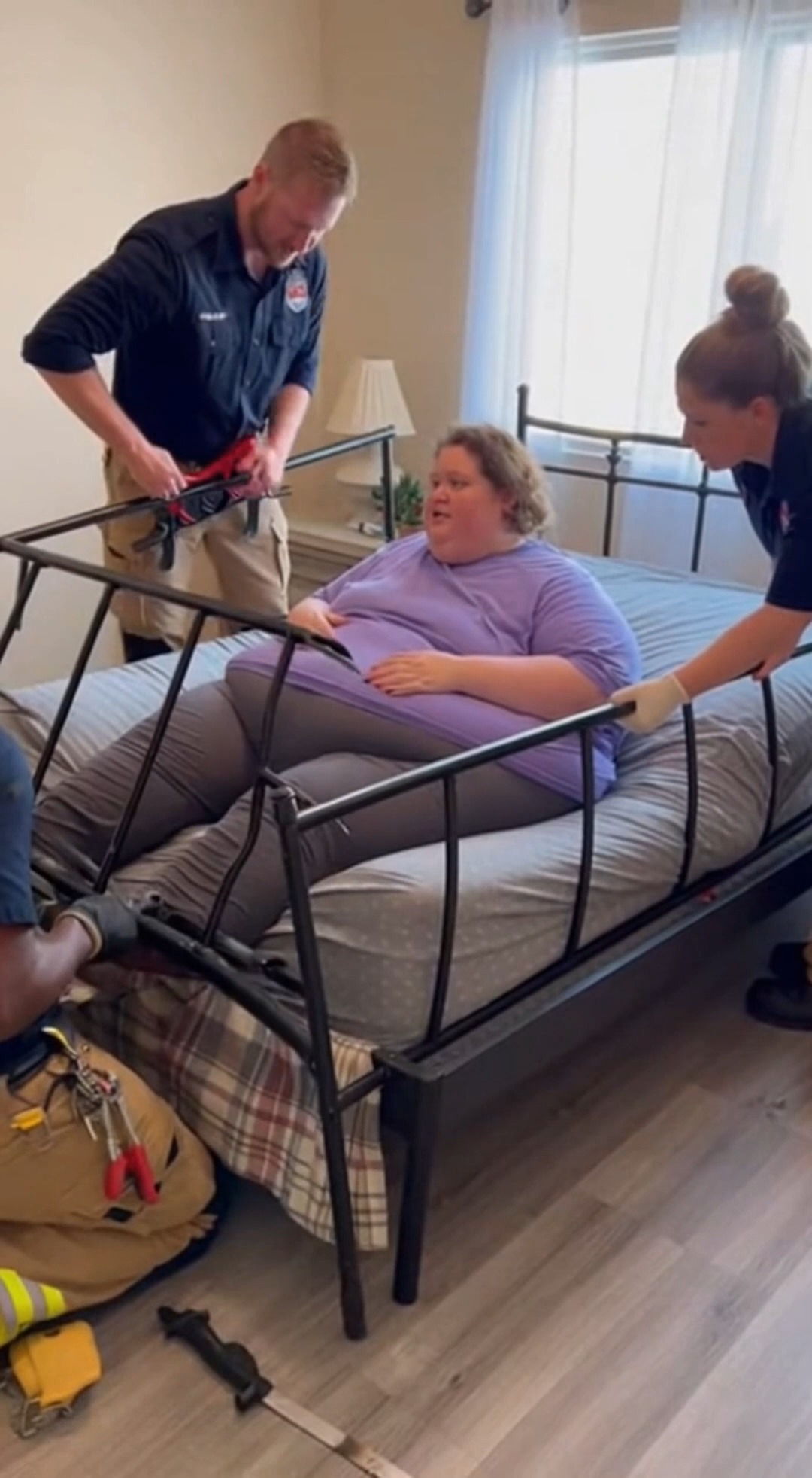 A woman stuck in the bed but rescue team save her. This video is ...