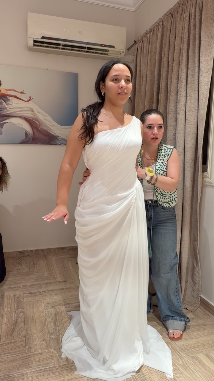 greek wedding dress designer Greek-inspired elegance in timeless white. 🤍✨, 📍 Sara Khalil | New Cairo, 📞 01157090948, 🕒 Sunday–Thursday cream dress with black tropical print Color:Charcoal Nude aphrodite greek goddess wedding dress