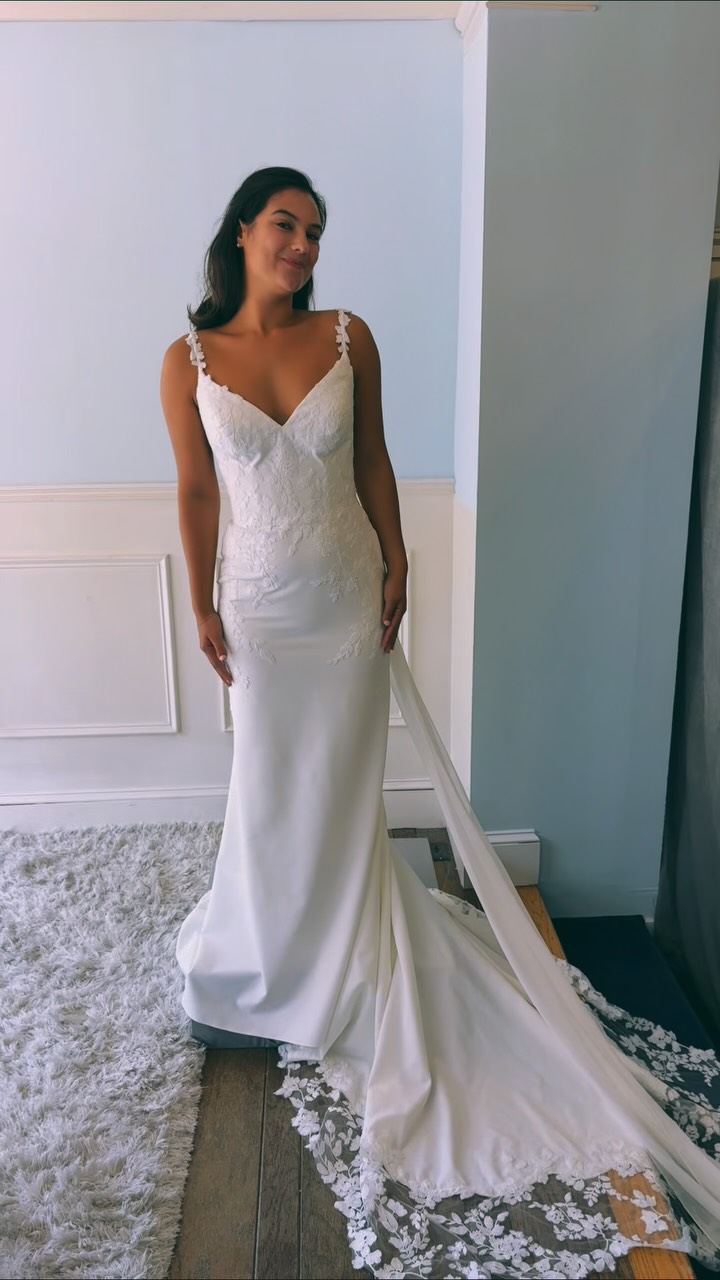 The front is gorgeous… but WAIT for the back 🤍✨, Style 44594 from Sincerity Bridal giving us lace, crepe, a fit-and-flare silhouette + that dreamy cutout train., Would you try her on? Make your 