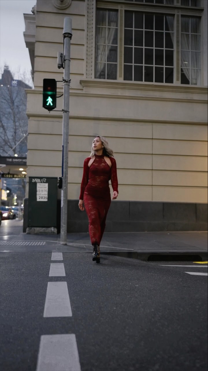 red dress grey boots No runway. Just the streets of Melbourne. Confidence does the rest. Hair: @frankenstylehair Makeup: @themillionpearls Dress: @suboostyle Boots: @prada Dress: @studio.lexi #sonyf short red dress with boots