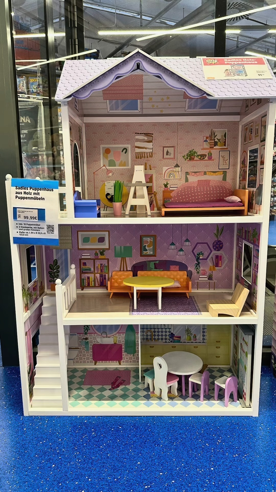 219082 🩷 84,99€ Fais vivre de belles histoires à tes poupées avec La Maison de Poupée en Bois de Sadie 🏡💖 /s8yc656c Tes poupées peuvent se prélasser dans le salon, ou descendre