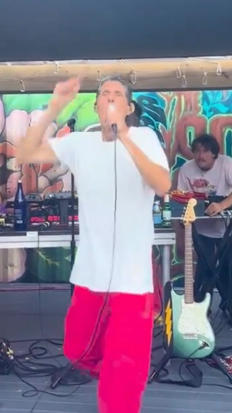 Mike D performing a free show at the Sound Garden in Baltimore