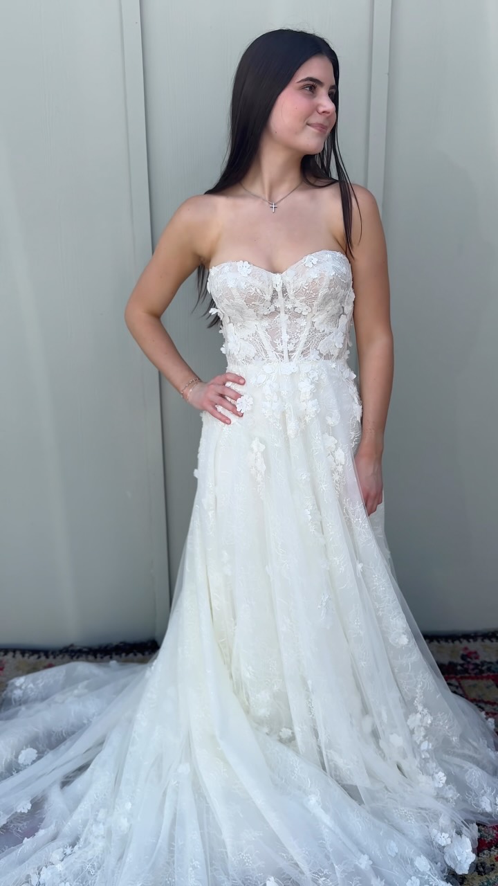 The 3D floral detail on this dress is absolutely jaw-dropping! , Find your dream wedding dress for a fraction of retail! Call us today to book your appointment and come find the one. , #consignment 