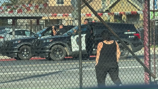 Stand off going on and lady walks through and disobeys orders from ...
