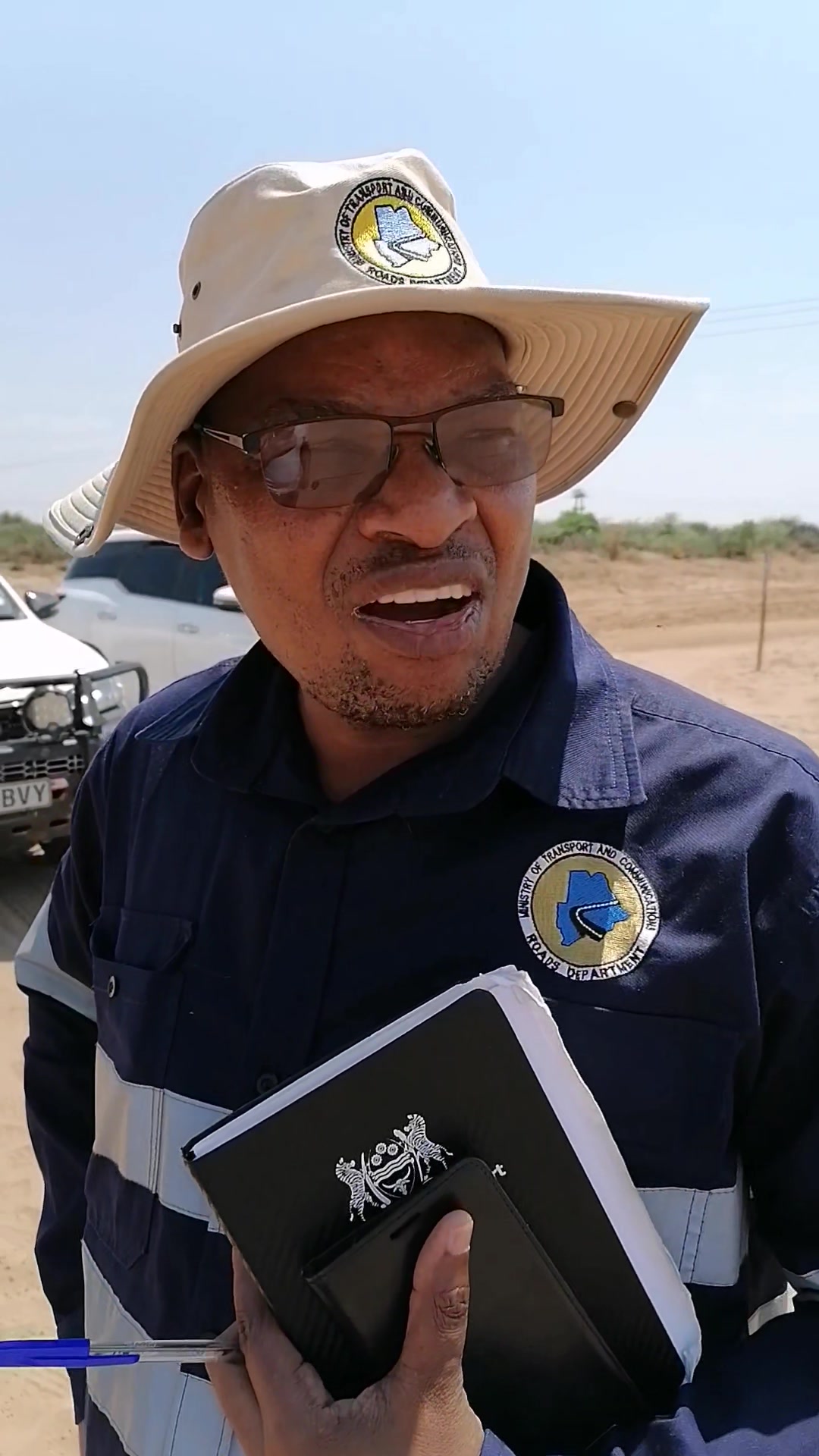 Mr. Lekang Motshwaedi, Deputy Director of the Roads Department, giving ...
