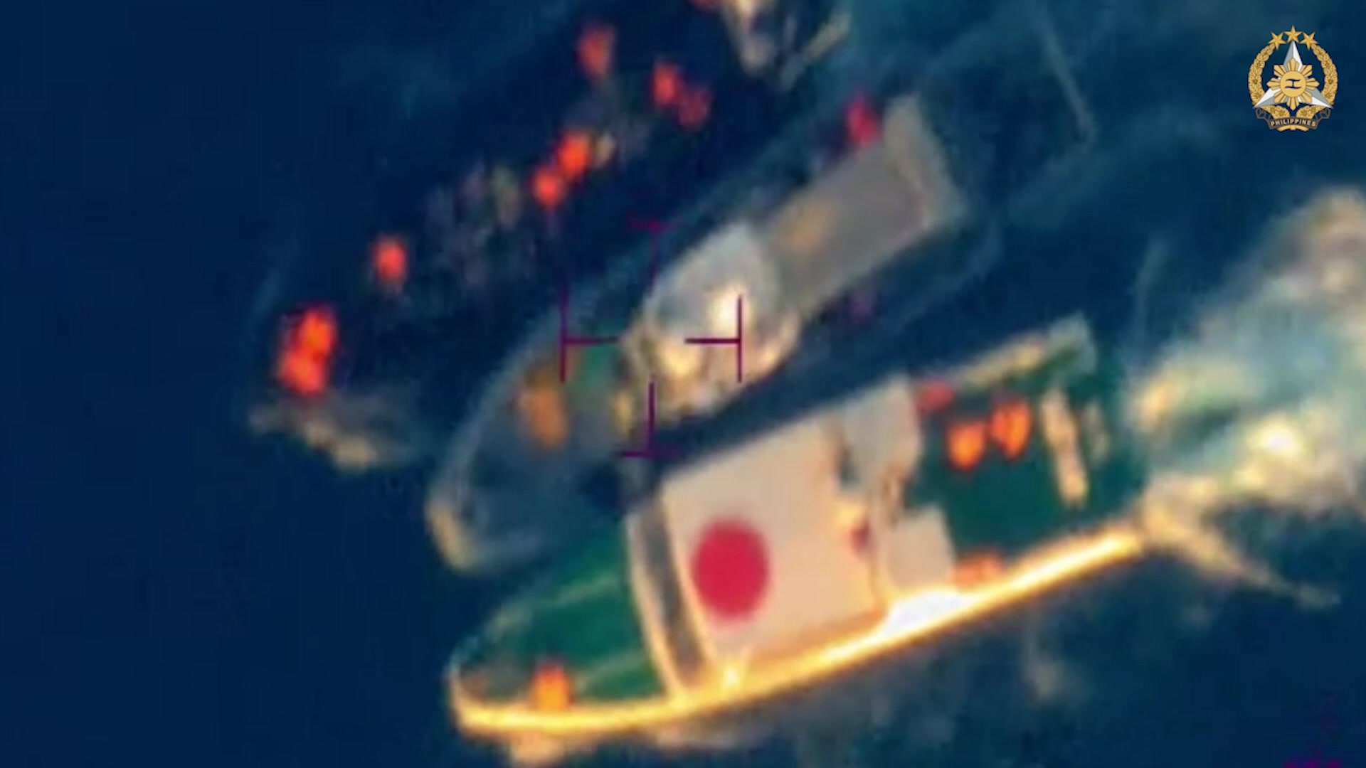 Crammed in the middle by two CCG boats is an AFP Rigid Hull Inflatable ...