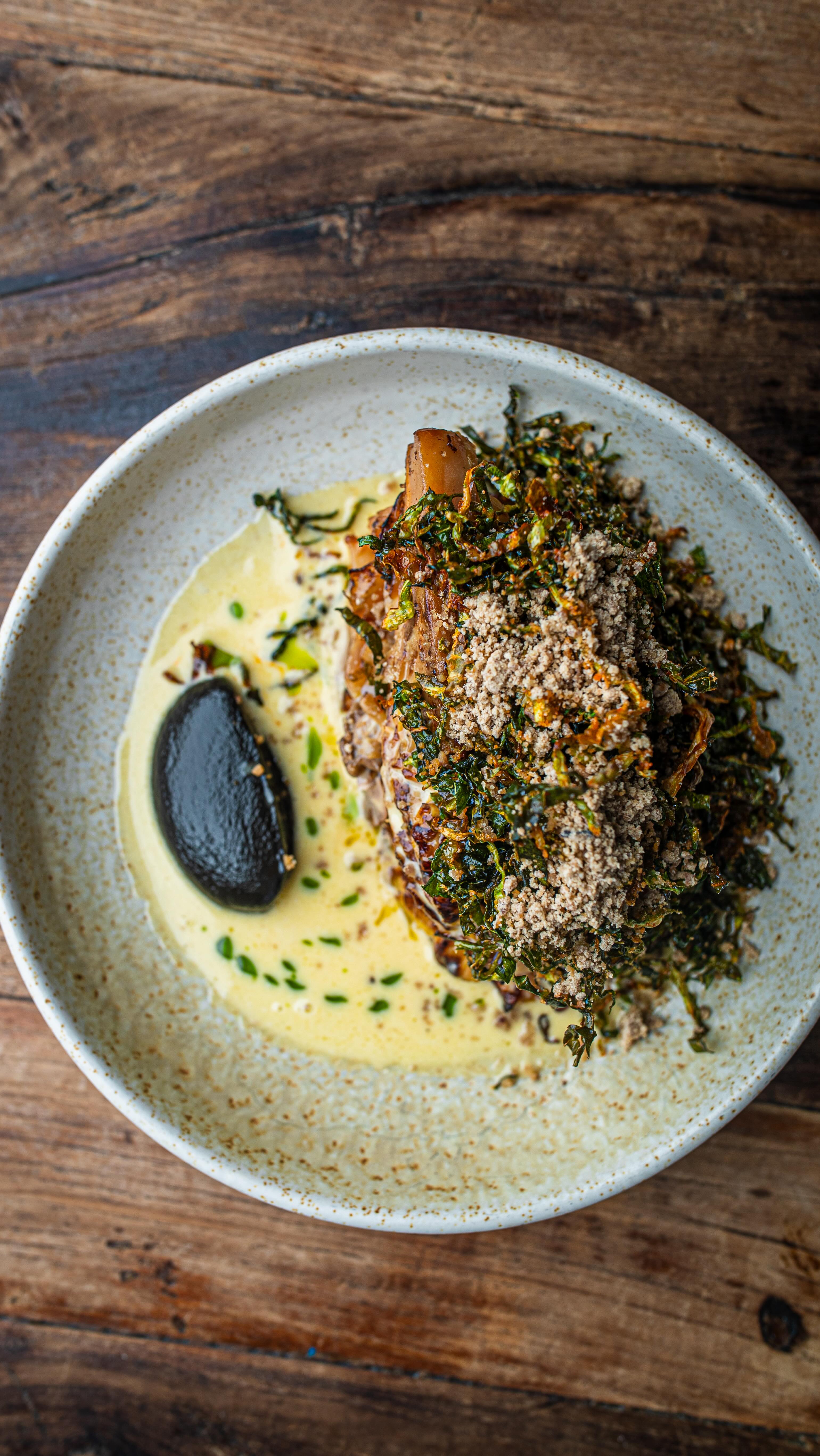 A Fallow classic that’s back on the menu - confit cabbage, black garlic ...