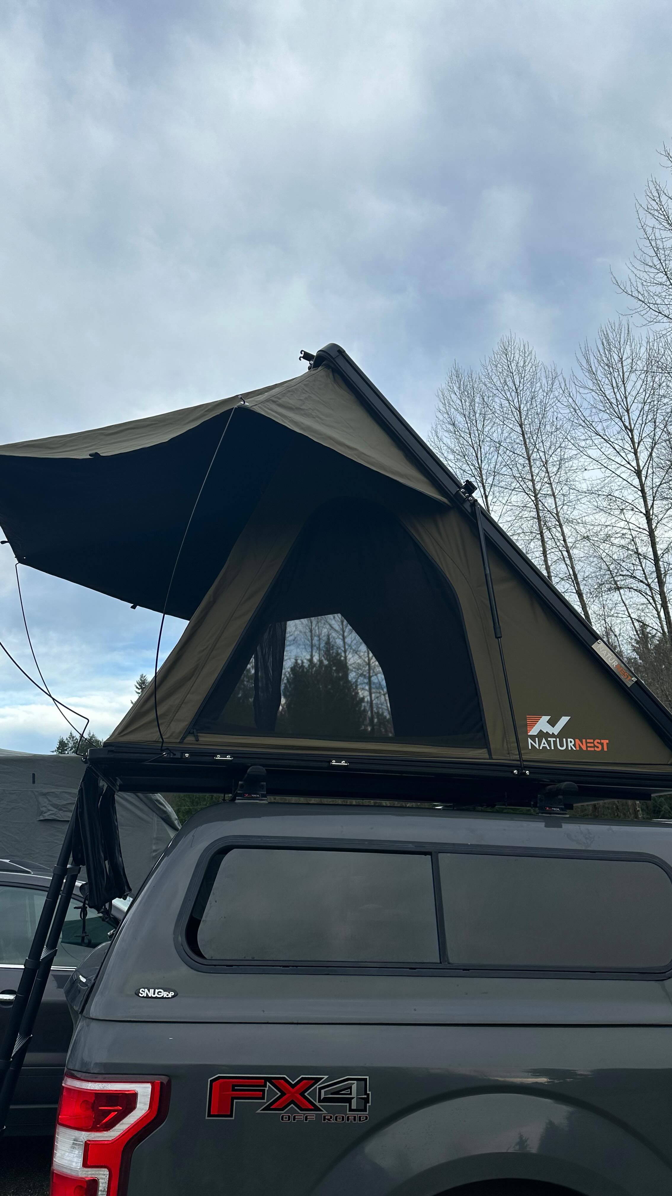 Hunt rig got a new rooftop tent upgrade. This @naturnest_rooftop_tent ...