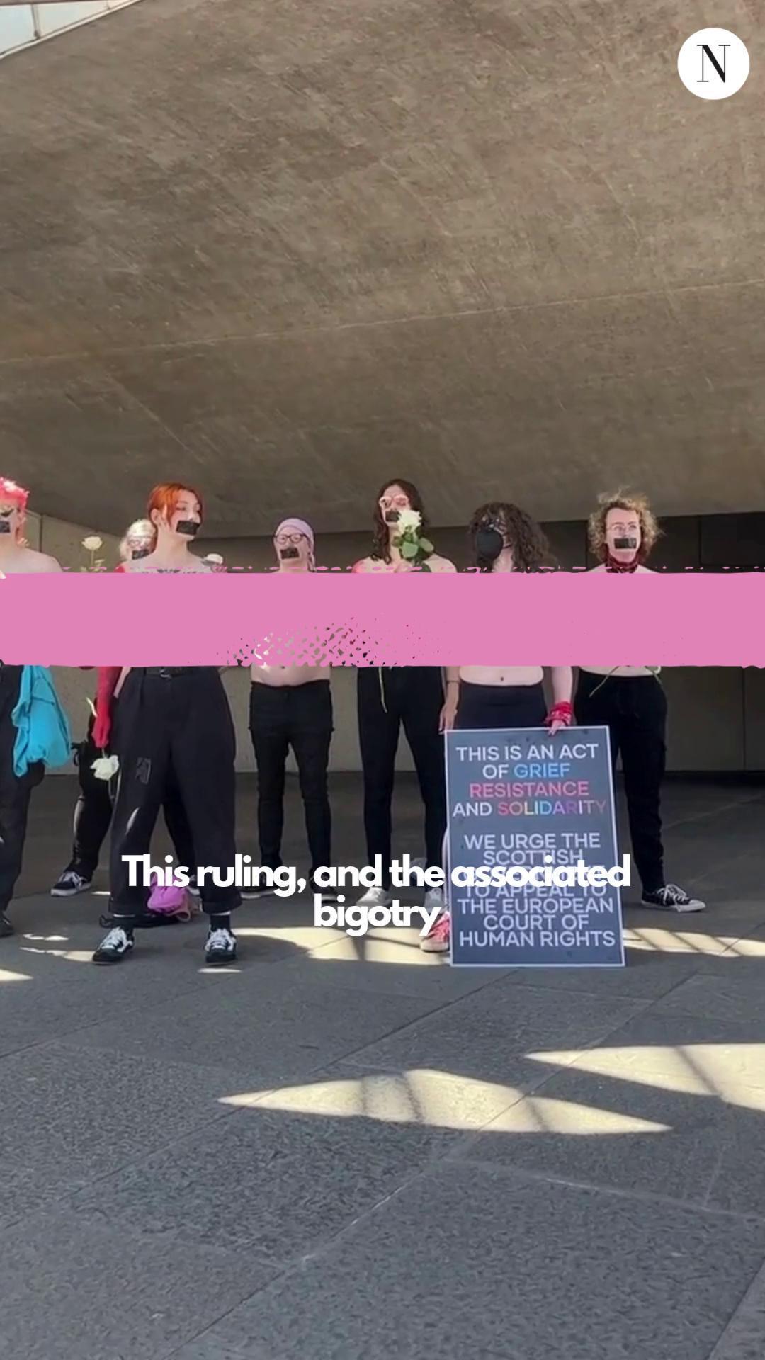 NEW: A group of trans women have staged a topless protest outside the ...