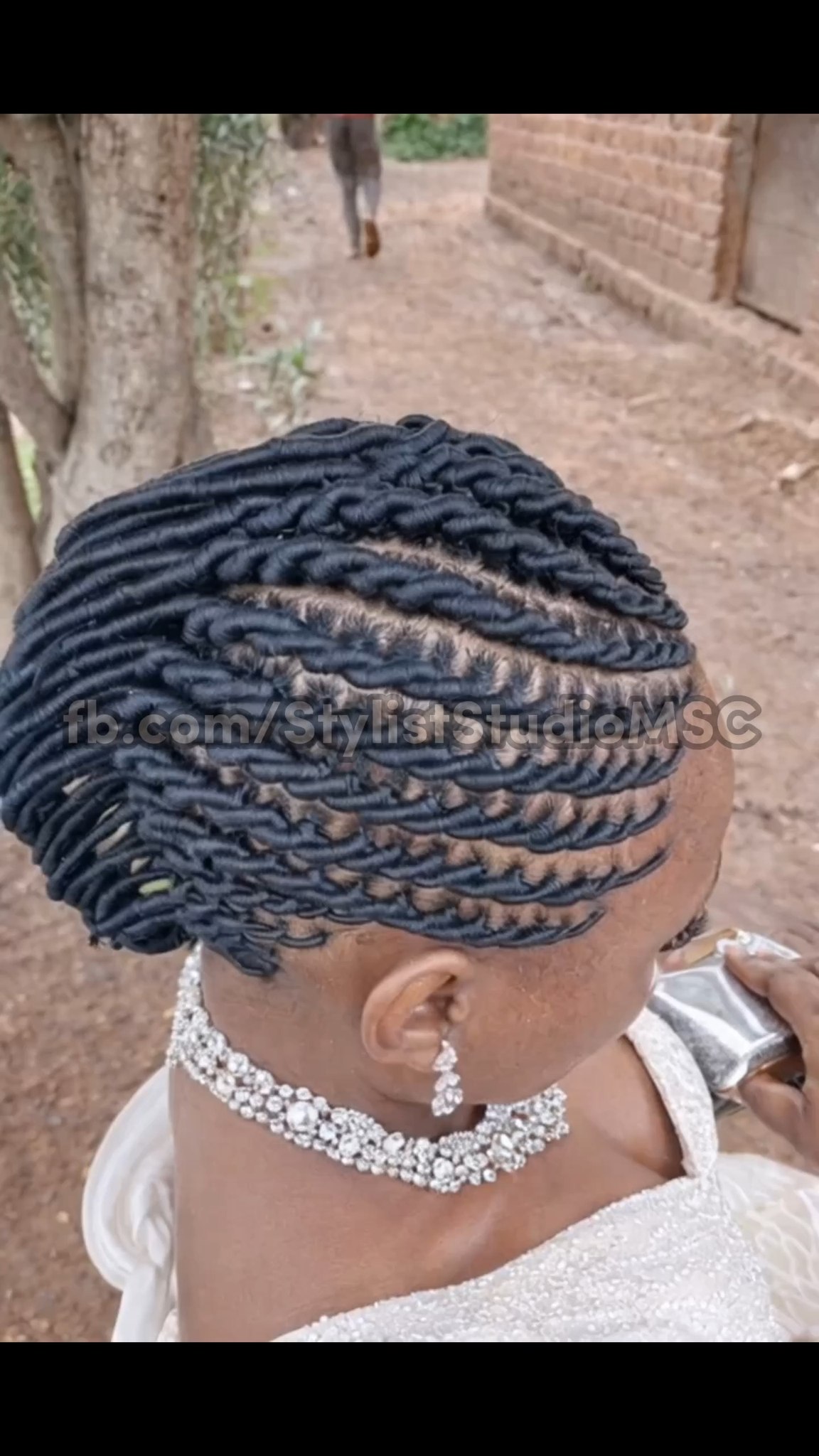 Bold rope braids layer the crown with strength and natural flow. # ...