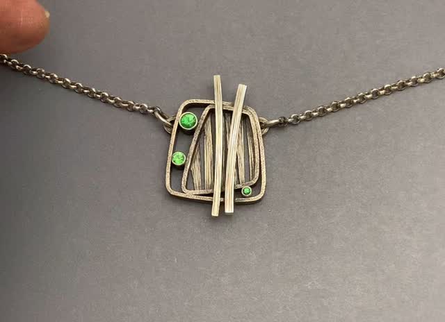 This is a recently completed 3-layered riveted pendant I hand ...