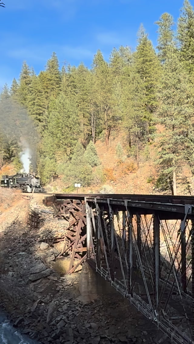 480 leads a mixed consist on the High Bridge during the Fall ...