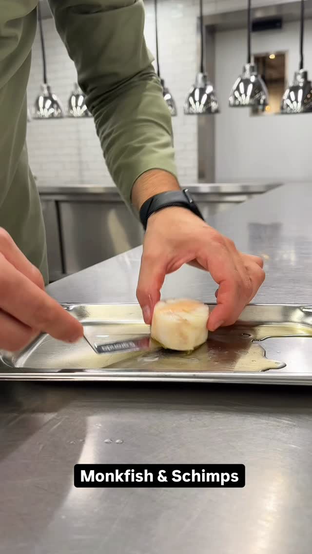 A steamed #monkfish roulade filled with shrimp farce and wrapped in ...
