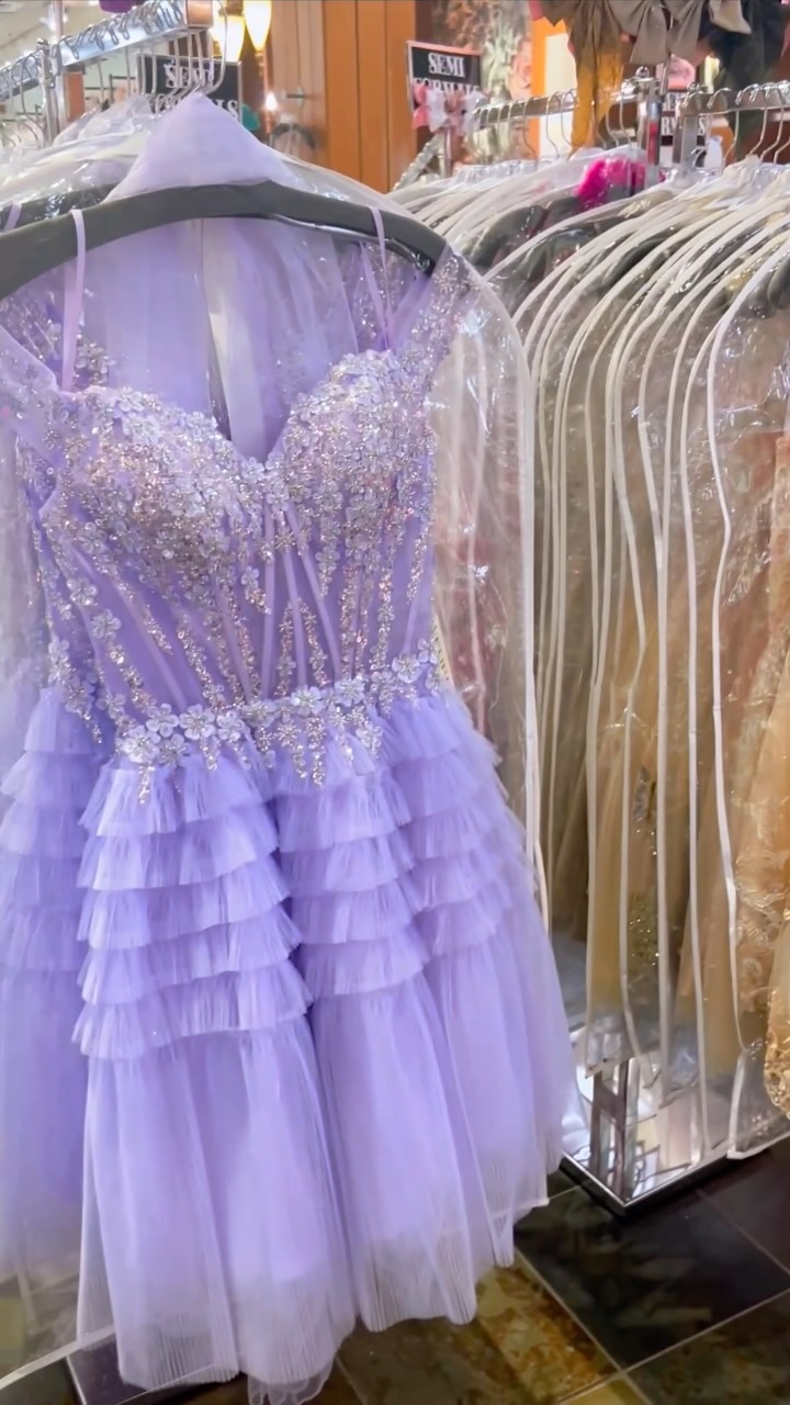 Everybody come see our cute lilac damas’ dresses, perfect for quinceañeras at Bliss! #ogdenutah #damasdresses #quincenera #homecomingdresses #semiformaldress | Bliss Dresses Utah