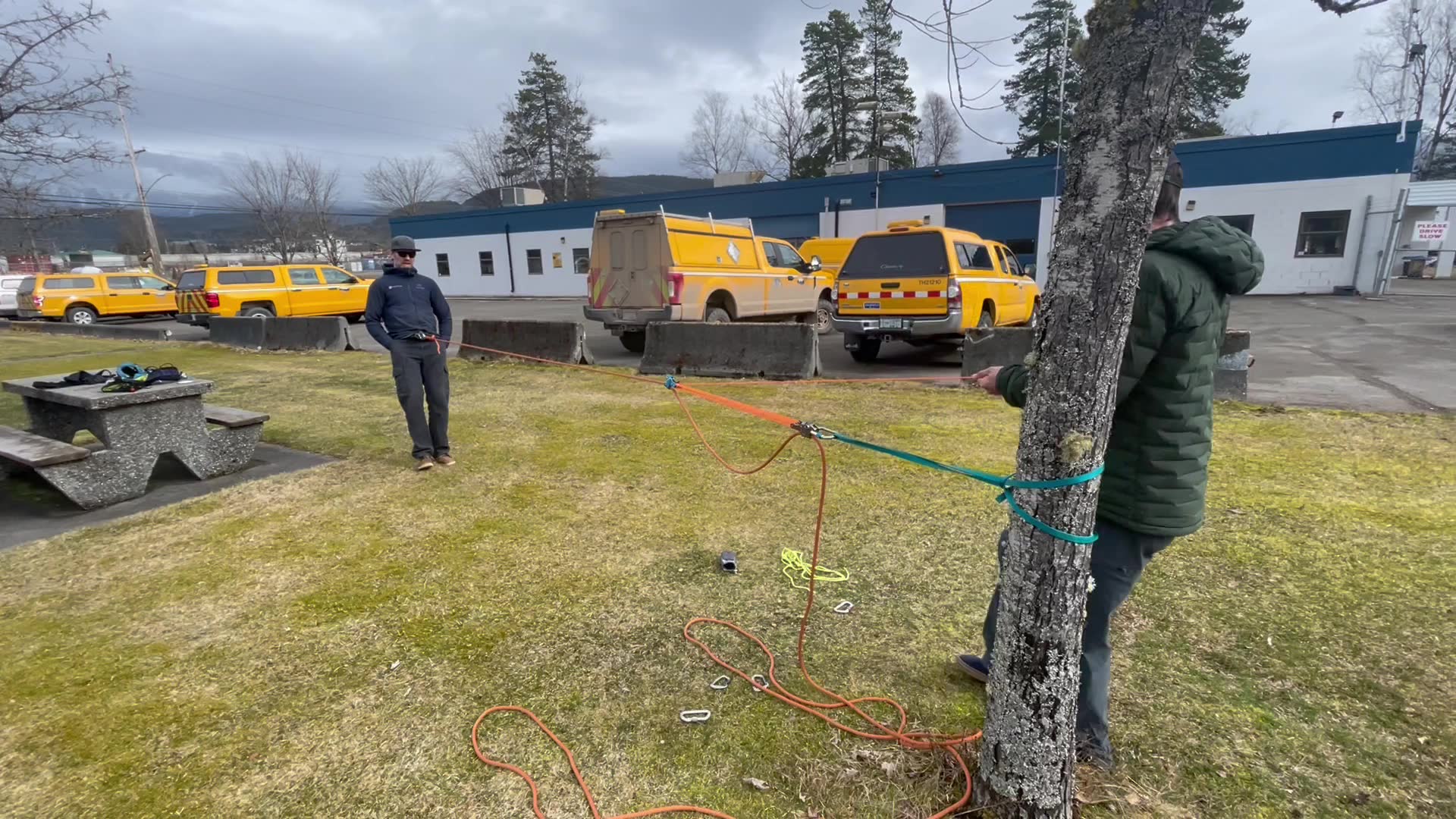 Avalanche control techs performing rope rescue training. The device ...