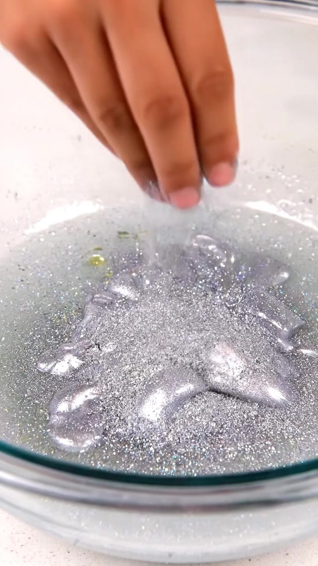 Metallic soap foam combines the playful texture of soap bubbles with a ...