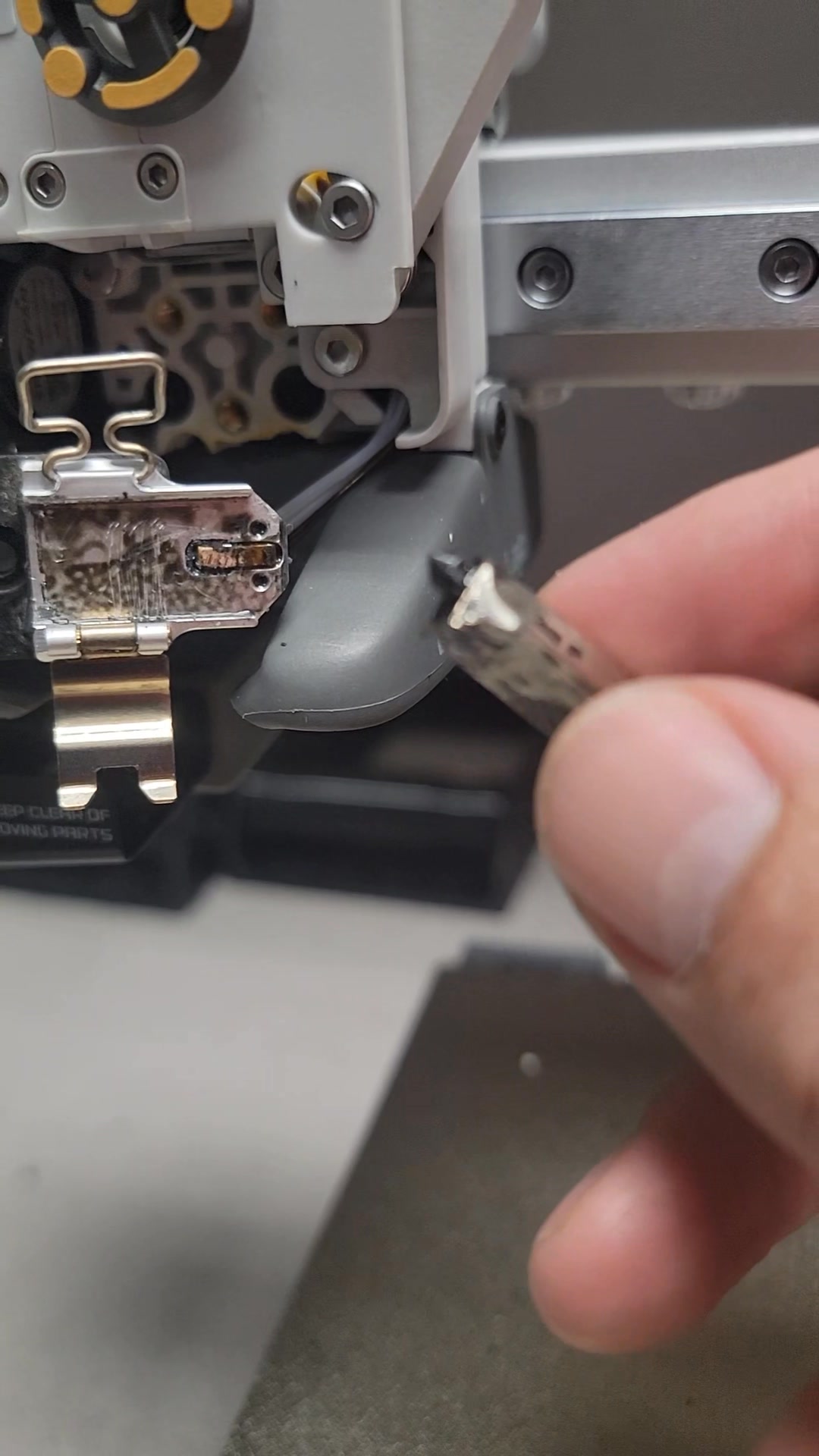 What causes a burning smell on the A1 Mini 3D printer?