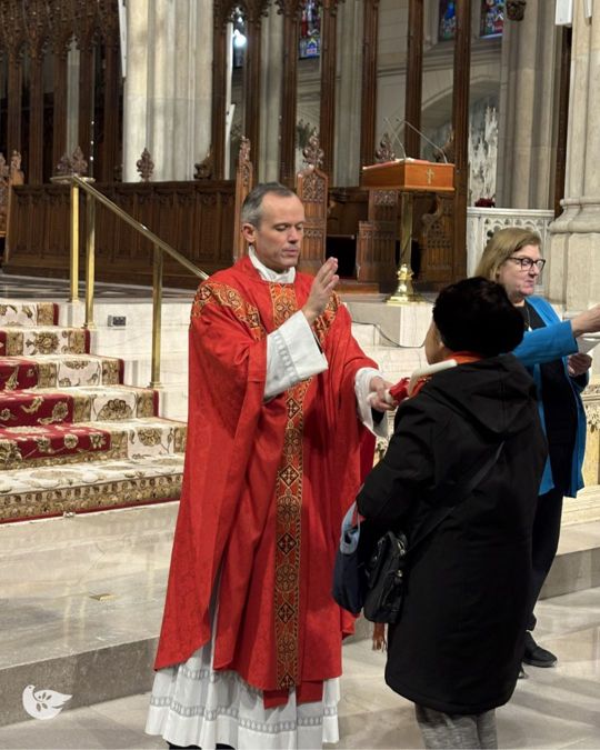 New Yorkers receive a traditional blessing of throats, a popular ...