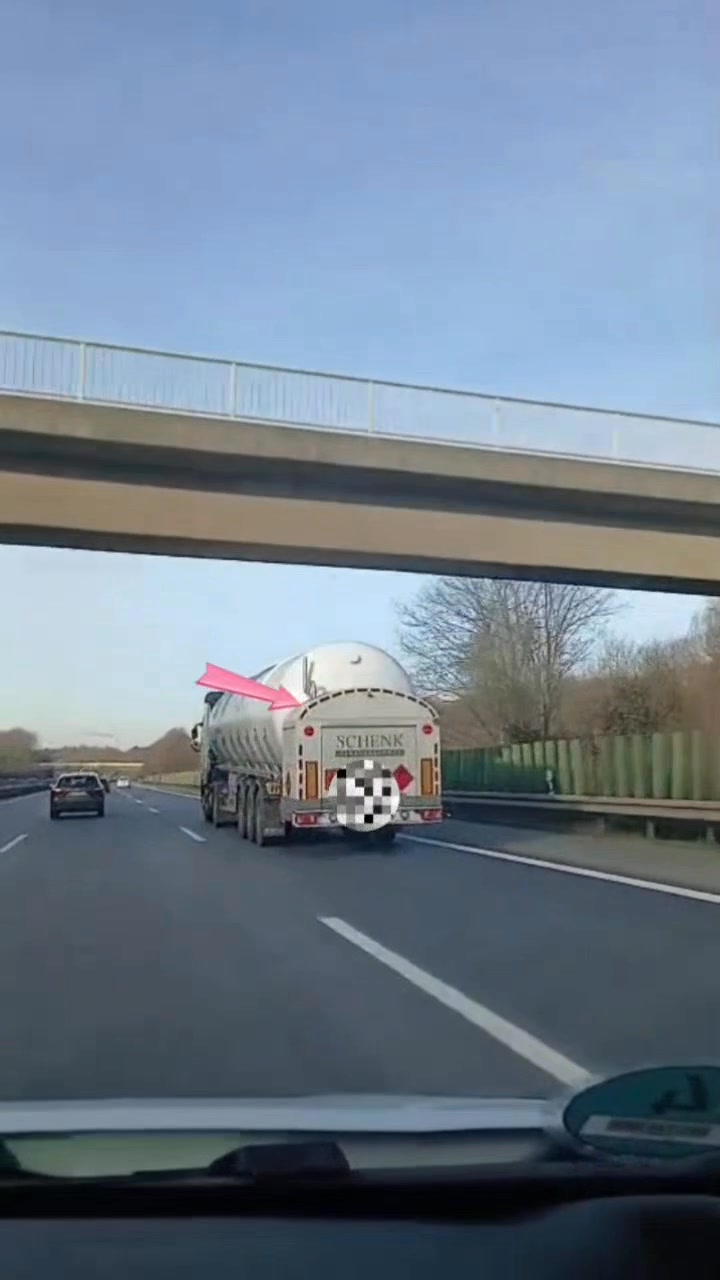 While we're overtaking this Big Tank Truck notice a big box or storage ...