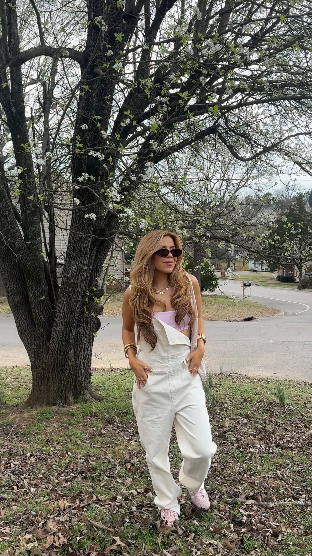 headed to record new music in the cutest white overalls from