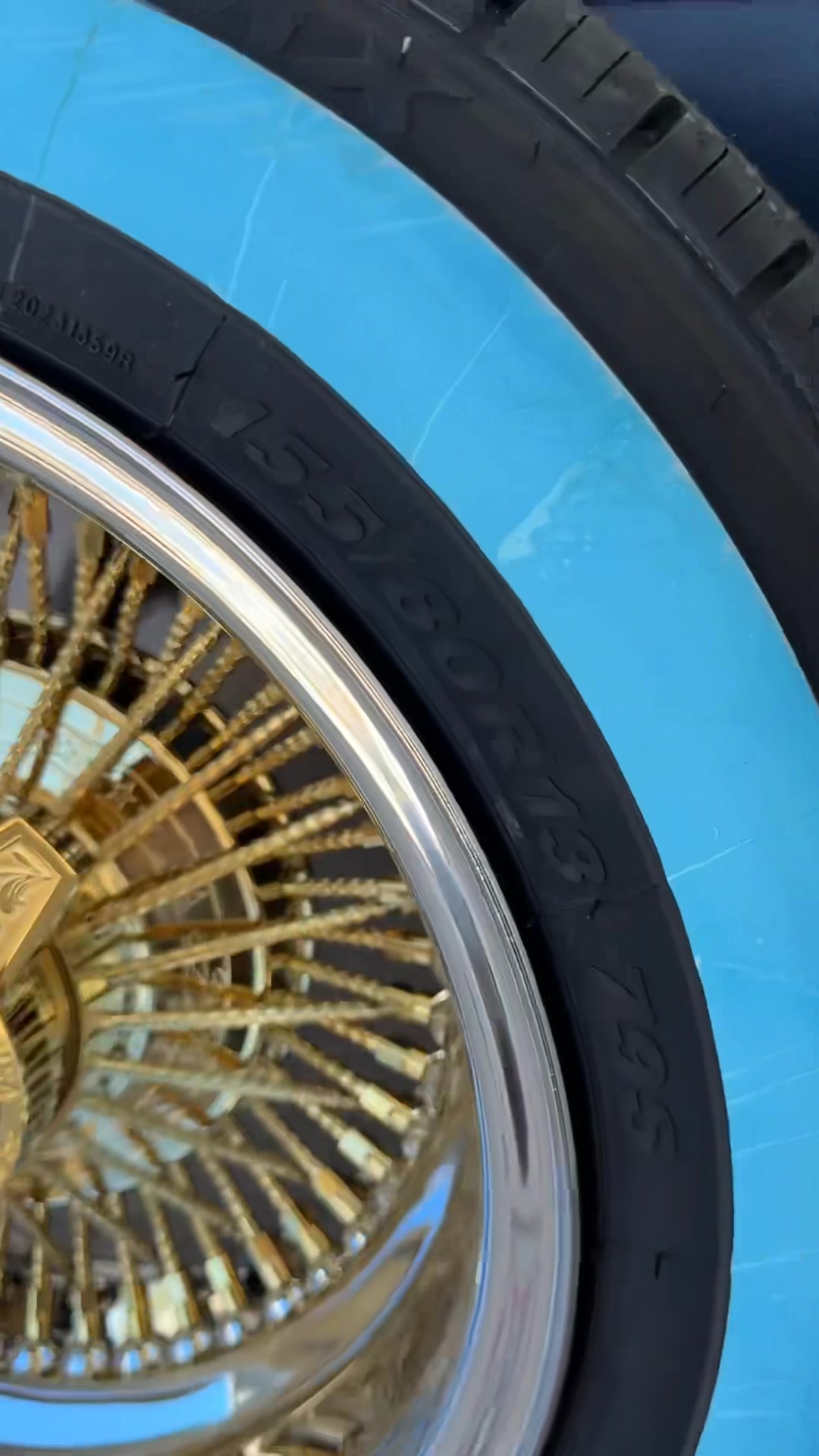 The new tires 155-80-13 GRIPMAX nice tire .. real fat white wall Gold ...