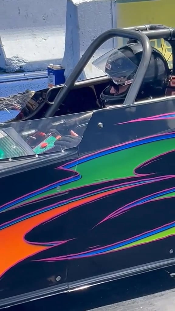 Stage my car with me for a qualifying pass... I didn't realize my hand ...