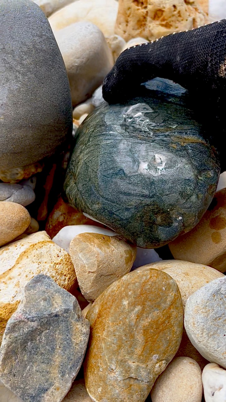 Digging up $999 worth of rocks, on a cliff from a former gold mine. # ...