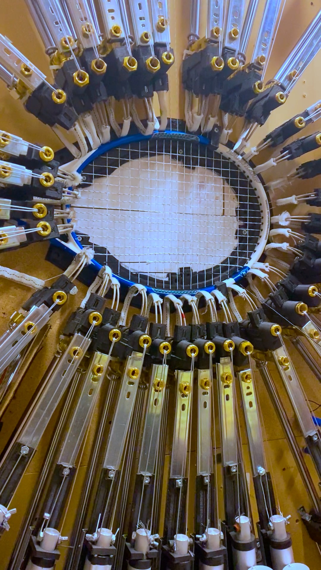 The World's First Automated Tennis RAcquet Stringer. This machine