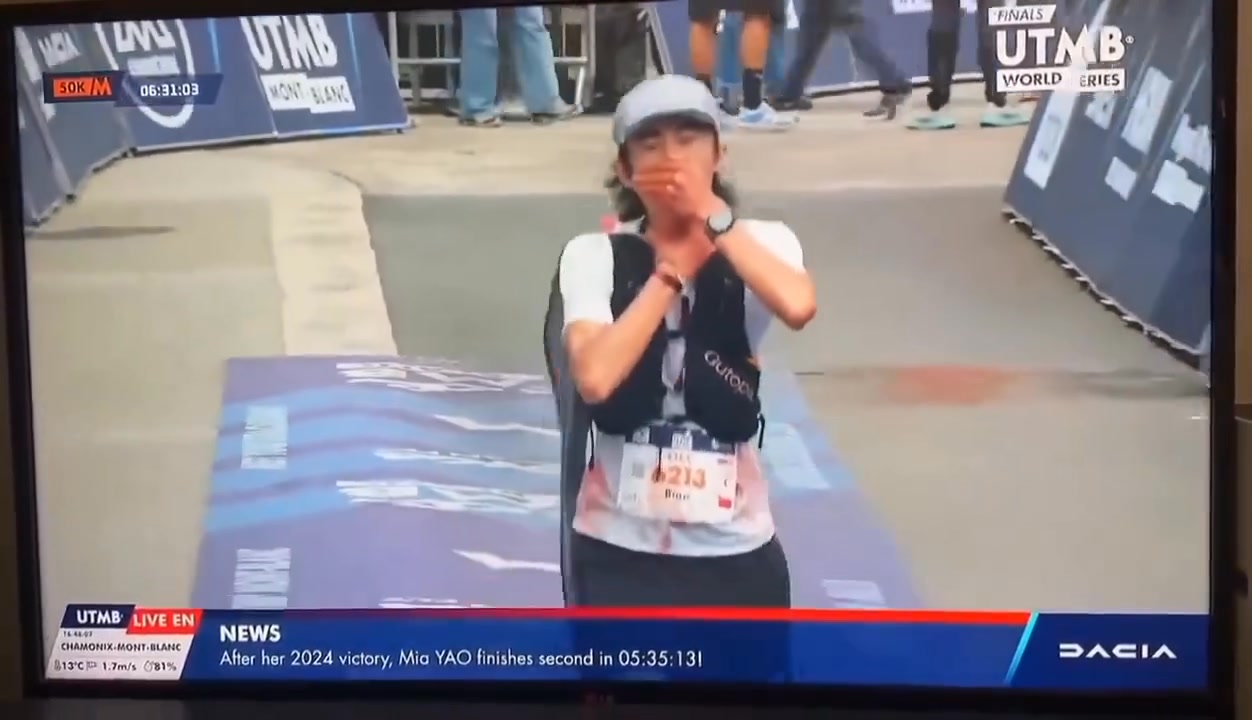 Wearing the flag of Palestine, Chinese runner Yu Biao finished the OCC ...