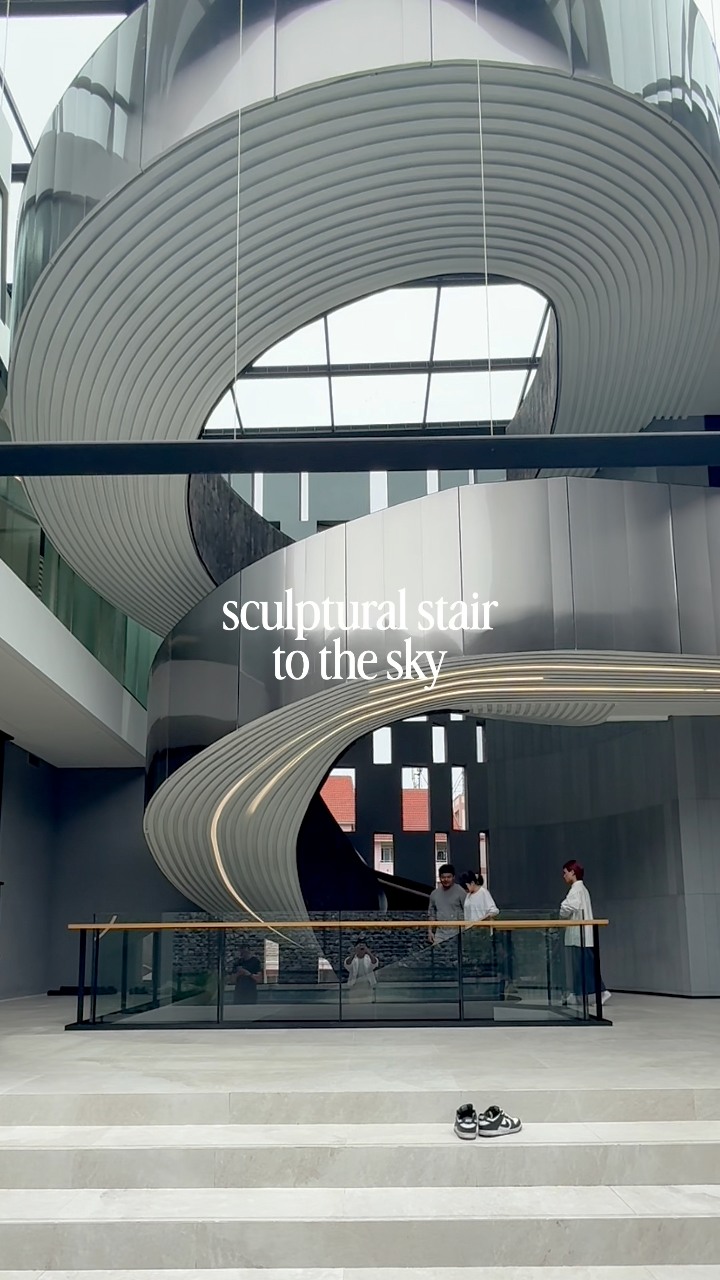 Sculptural stair to the sky. The centerpiece of this 4,000 sqm ...
