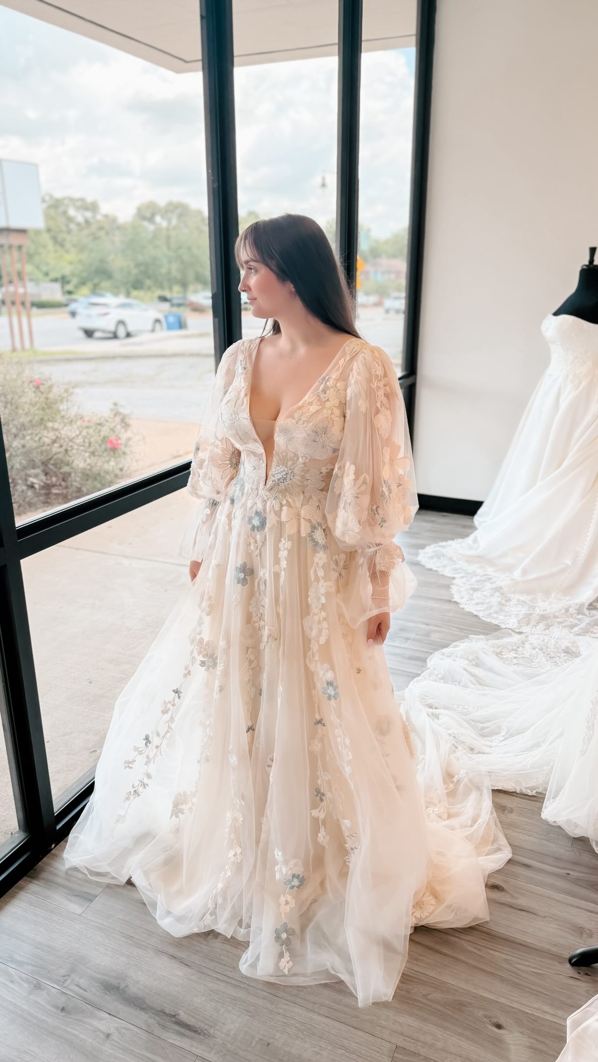 Soft creams, dreamy blues, and a gown that feels like it was painted straight out of a love story 🤍💙, Saylor by All Who Wander is all about ethereal movement and unexpected color tones that feel 