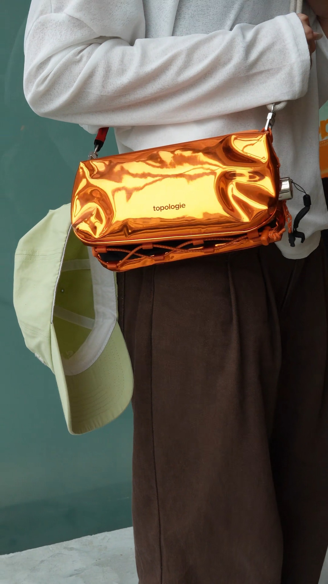 Get ready for rainy day with Topologie Bottle Sacoche Medium
