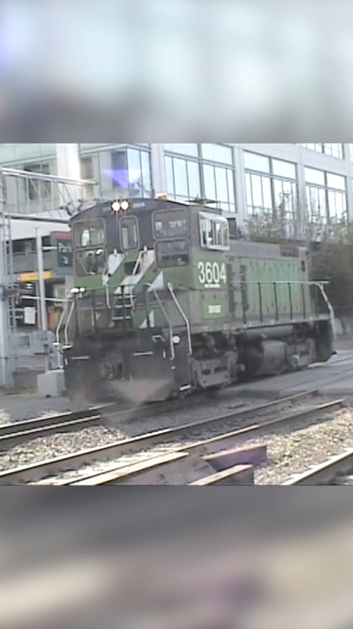 In a scene from June of 2003, a BNSF switcher locomotive rolls