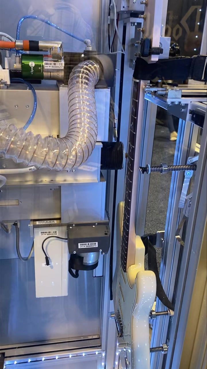 A PLEK machine mapping a fretboard. #NAMM2025 #VintageGuitarMagazine # ...