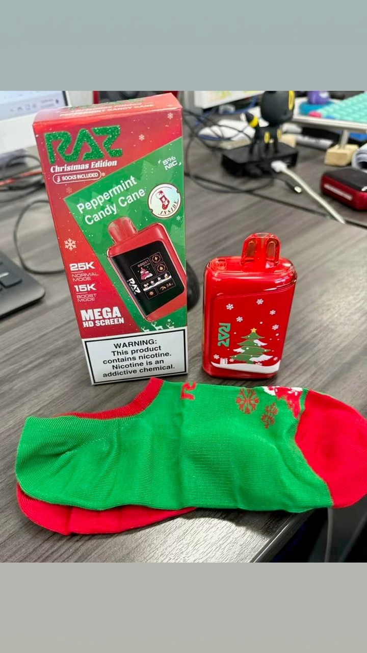 raz vape peppermint candy cane Christmas Edition is here!🌲 , Enjoy flavor 🍬 or Watermelon Ice 🍉 with a pair of cozy Christmas socks🧦. | Dobson Go Mart Nicotine Strength:0mg Manufacturer_Riot Squad SMOK NORD 4 Pod