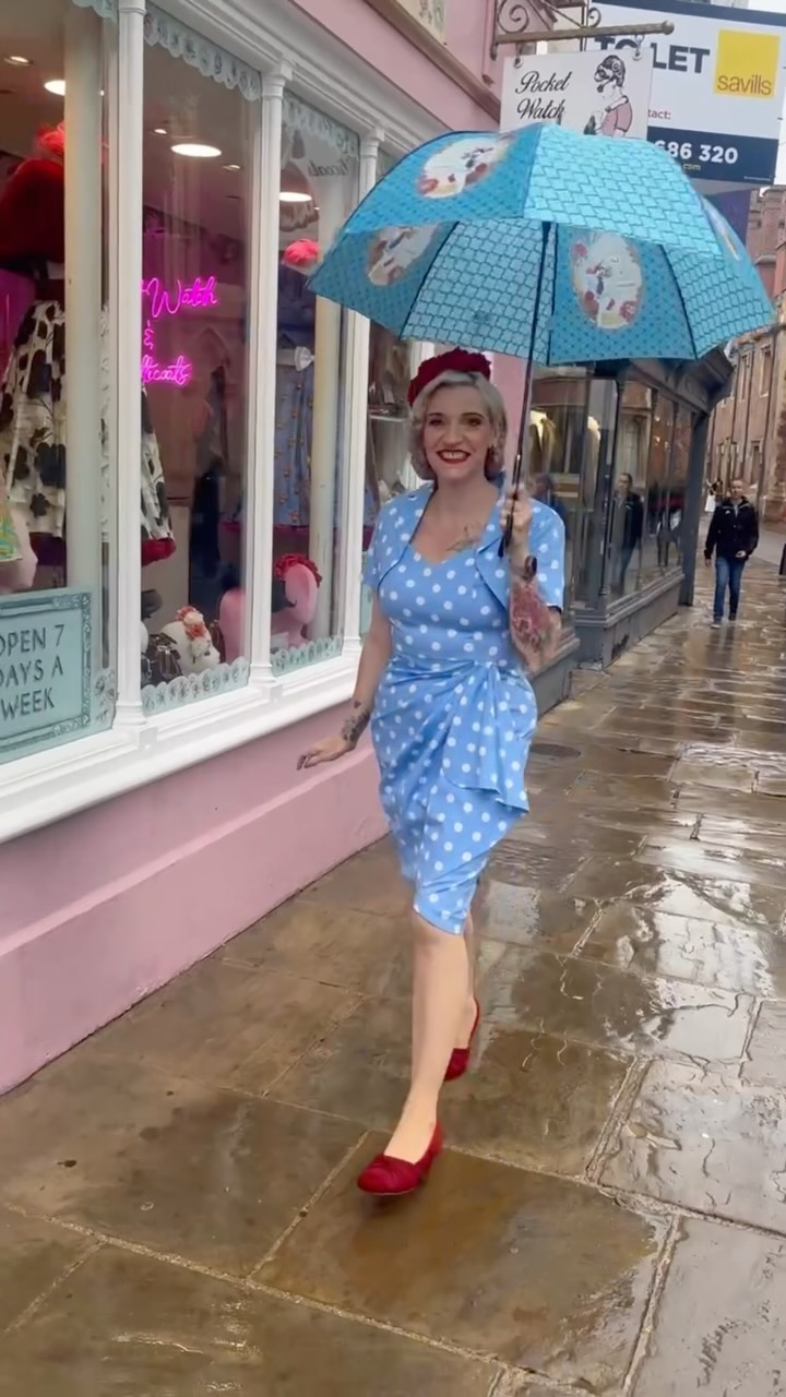 ☔️💙 WHO CARES ABOUT A LITTLE RAIN?! 💙☔️ Not Miss Heide Hi! 😍 Dancing in the rain, brolly in hand and looking absolutely FABULOUS in our brand new Betty Blue Waterfall Wiggle