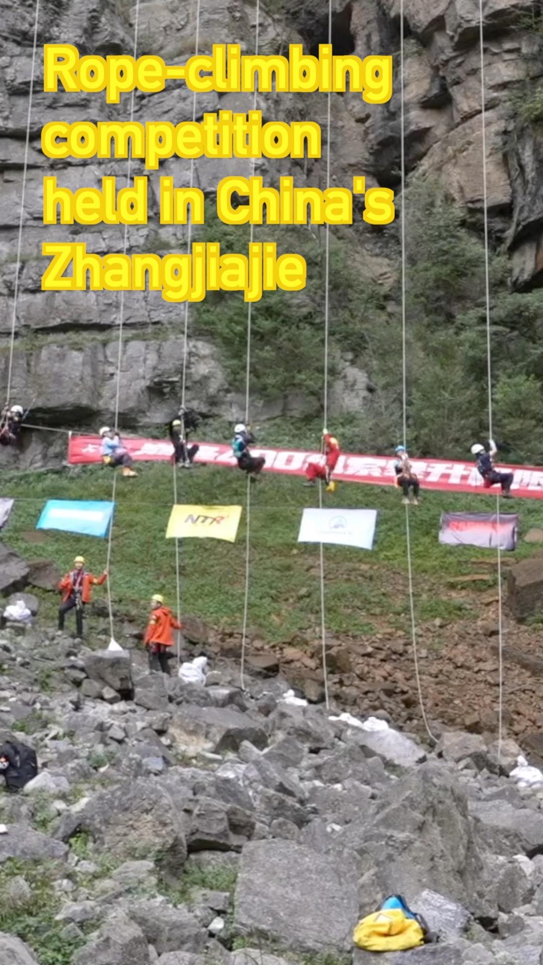 Wearing safety harnesses, 53 climbers raced to ascend 400-meter ropes ...
