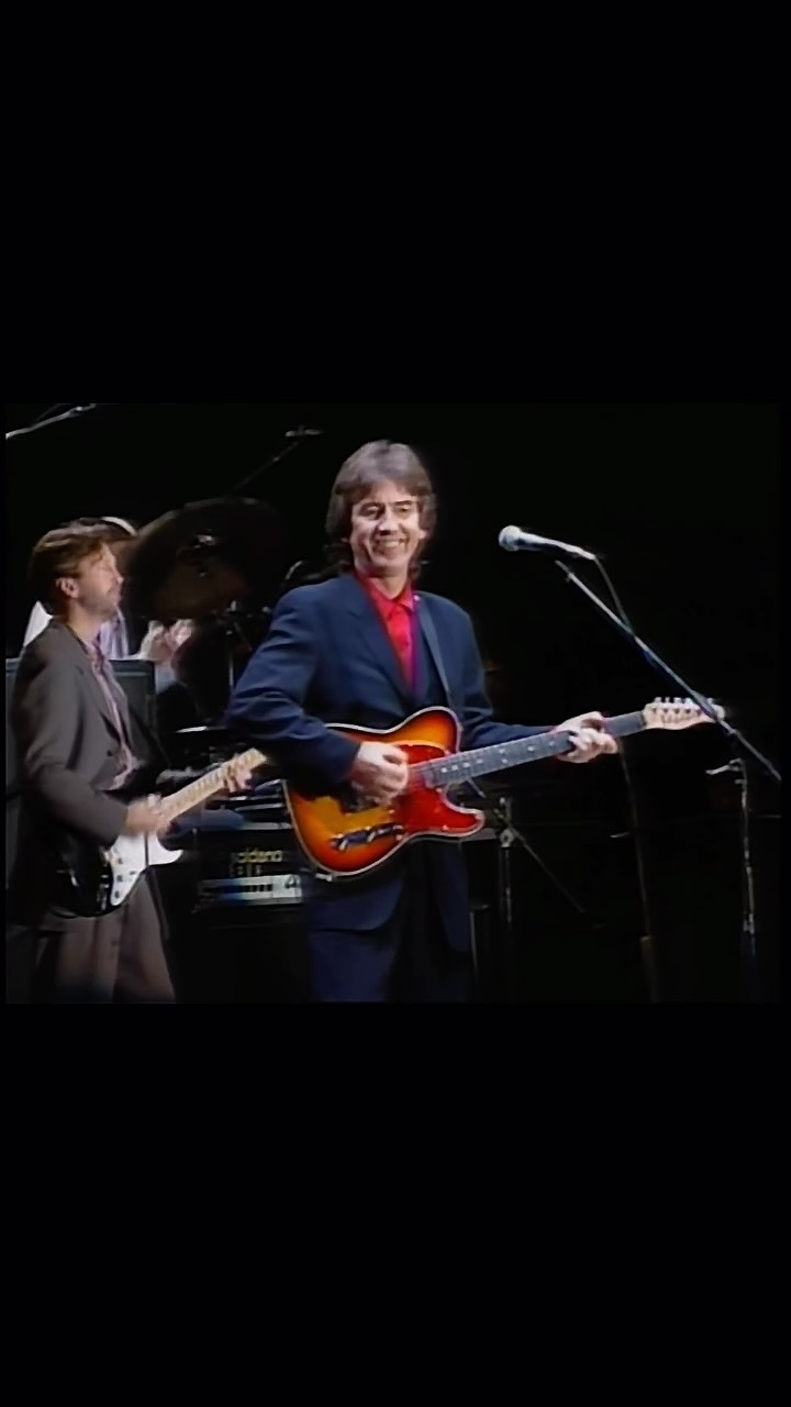 George Harrison and Eric Clapton live in Japan. -Matt-